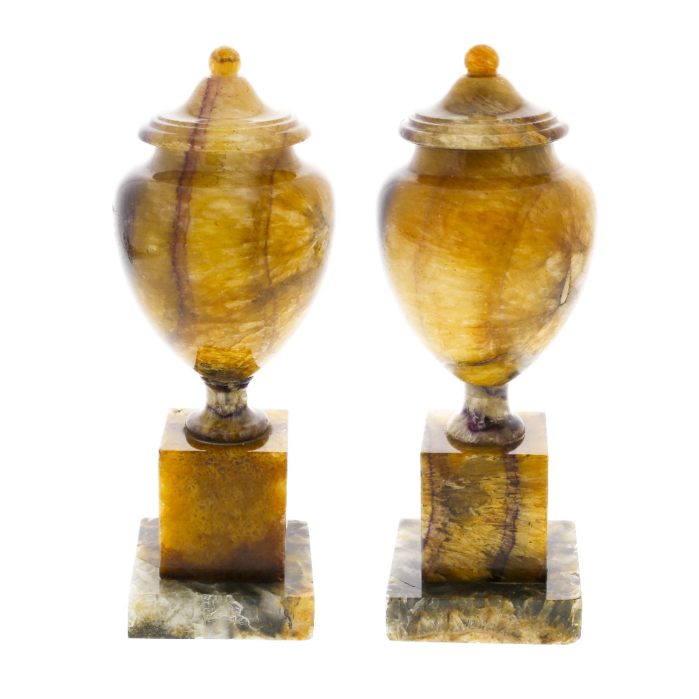 A pair of Blue John pedestal urns. Blue John Cavern vein group Each of ovoid form, the spreading