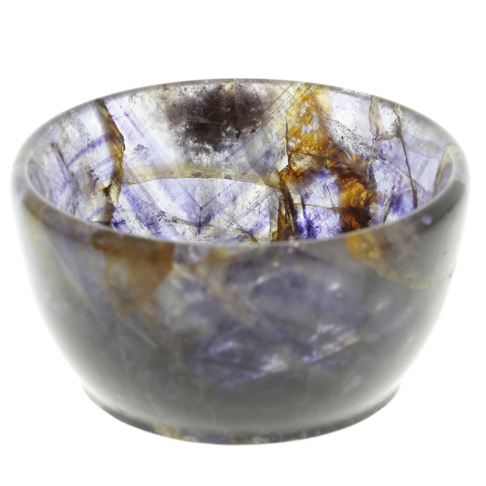 A small Blue John bowl. Of steep-sided circular form shading from translucent lilac to dark