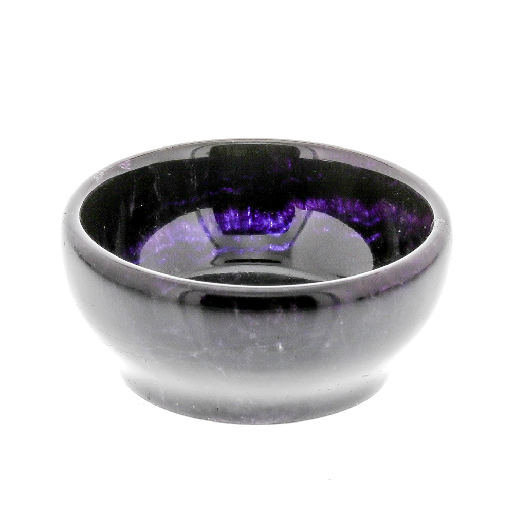 A Blue John bowl.  The ogee-sided body of deep amethyst hue, with veining visible under light,