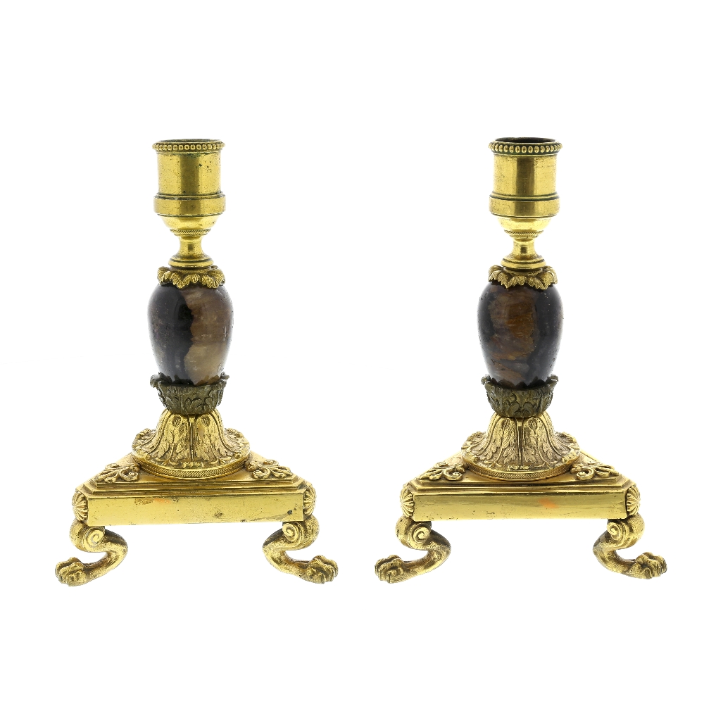 A good pair of Blue John ormolu-mounted candlesticks Early 19th century The bead-edged cylindrical