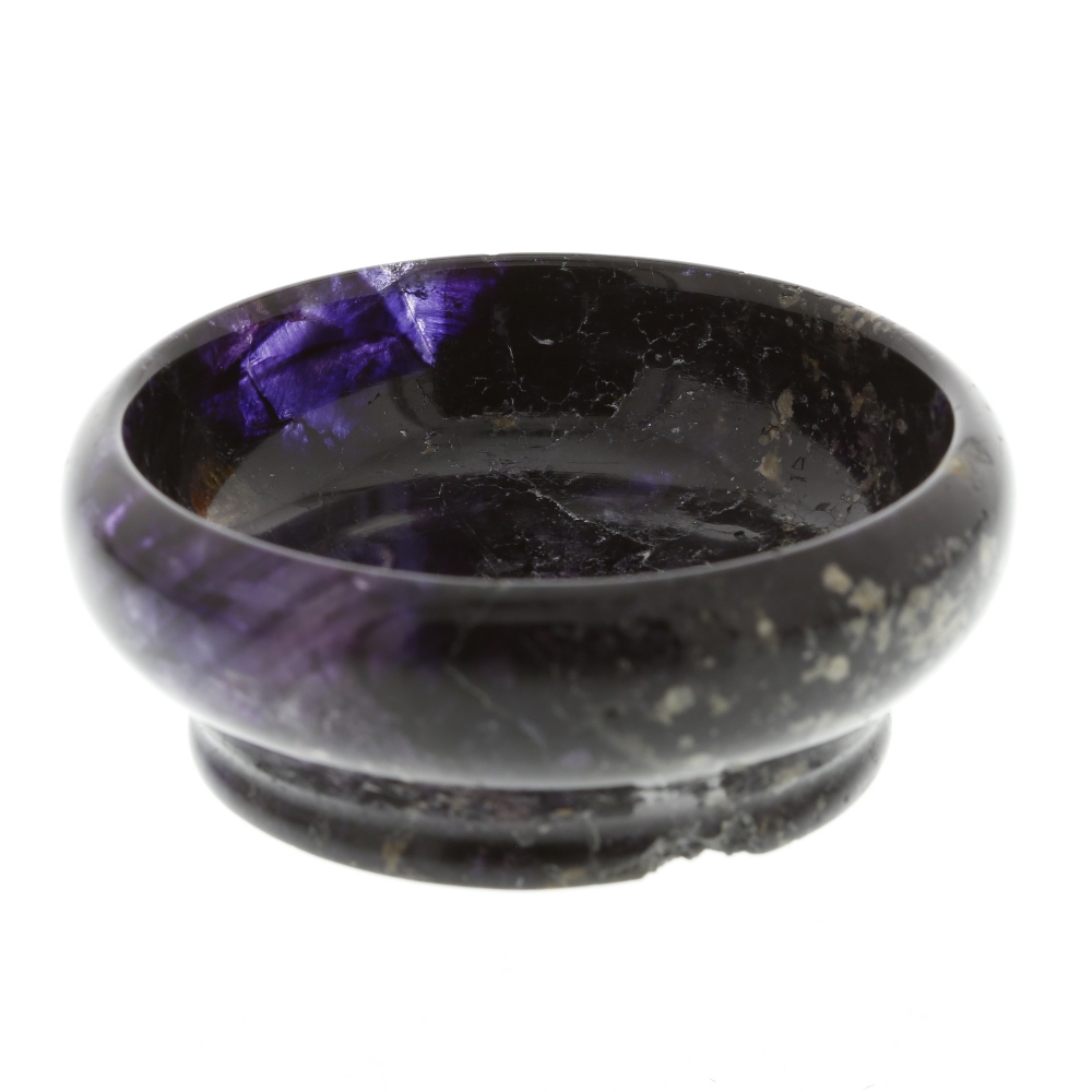 A small Blue John bowl Of bulging circular form and dark hue with amethyst highlights, 56mm diameter