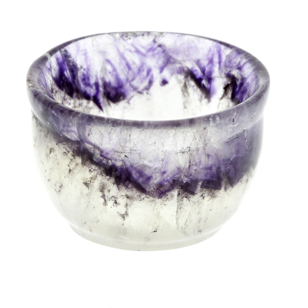 A small Blue John bowl. Of hemispherical form with flared rim over undulating band of purple