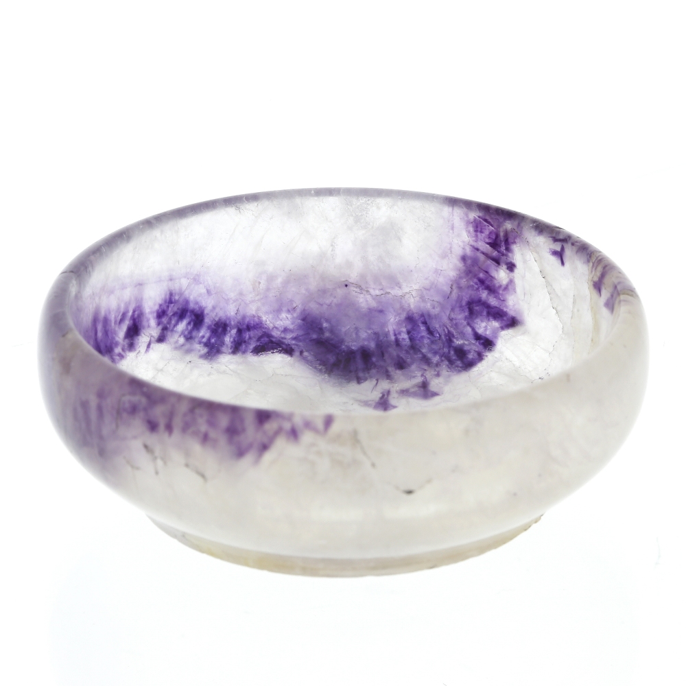 A Blue John bowl Of shallow circular form, the 'milky' ground with an arc of purple veining to