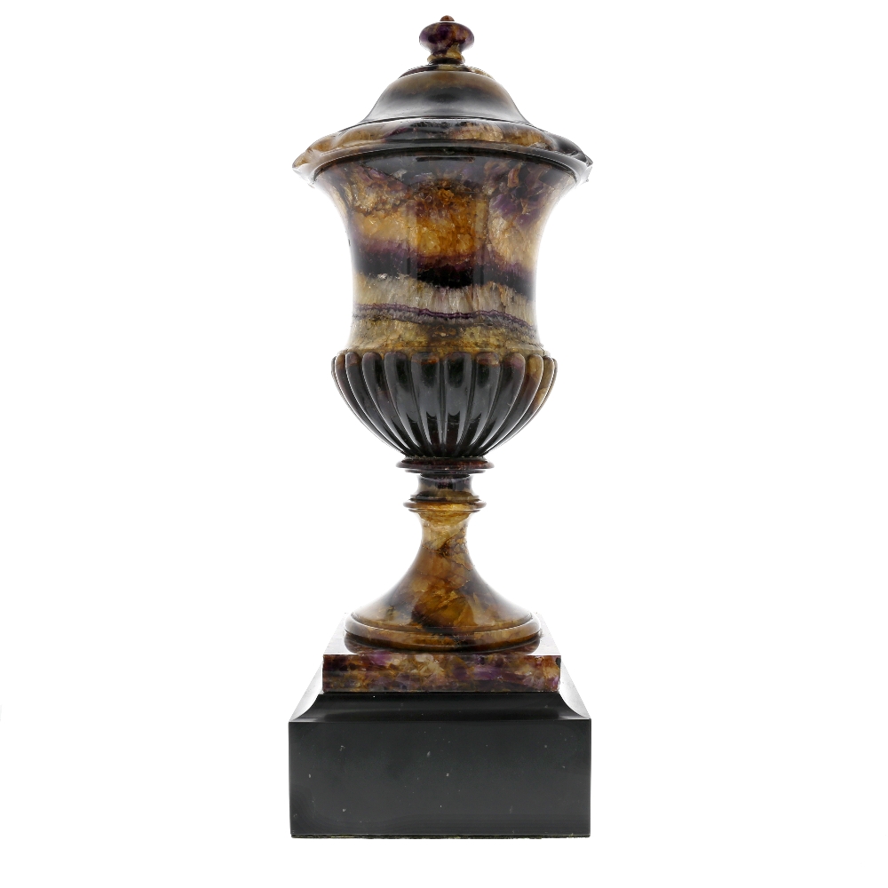 A superb Regency Blue John campana-form urn and cover Early 19th century The spreading cover with