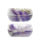 A pair of amethyst salts Each of dished oblong form with sloping sides, 62mm x 47mm x 18mm high,