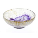A Blue John bowl The shallow hemispherical body with central leaf-shaped lilac marking, within clear