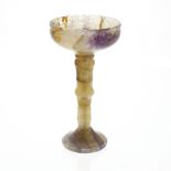 A Blue John pedestal cup The pan-topped circular bowl with lilac patch to the 'cracked ice'