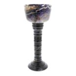 A Blue John pedestal cup or goblet The steep-sided bowl with channel beneath rim, a zig-zig vein