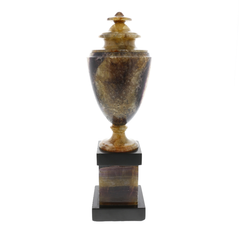 A Blue John pedestal urn. Winnats One Vein The shouldered ovoid body with tiered ring-knopped