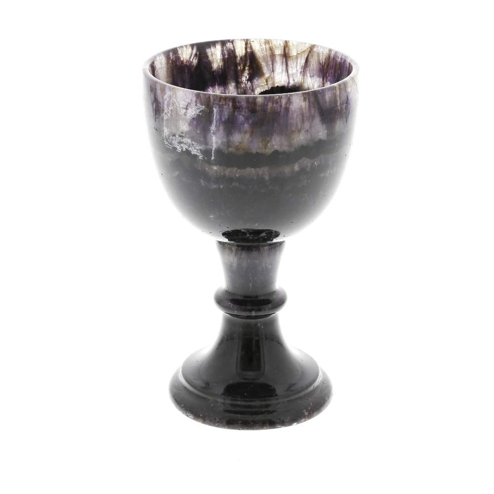 A Blue John goblet. Blue John Cavern vein group The rounded funnel bowl with pale rim over dark