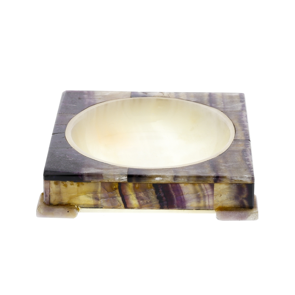 A Blue John and white onyx pin dish. The circular central well within square surround having