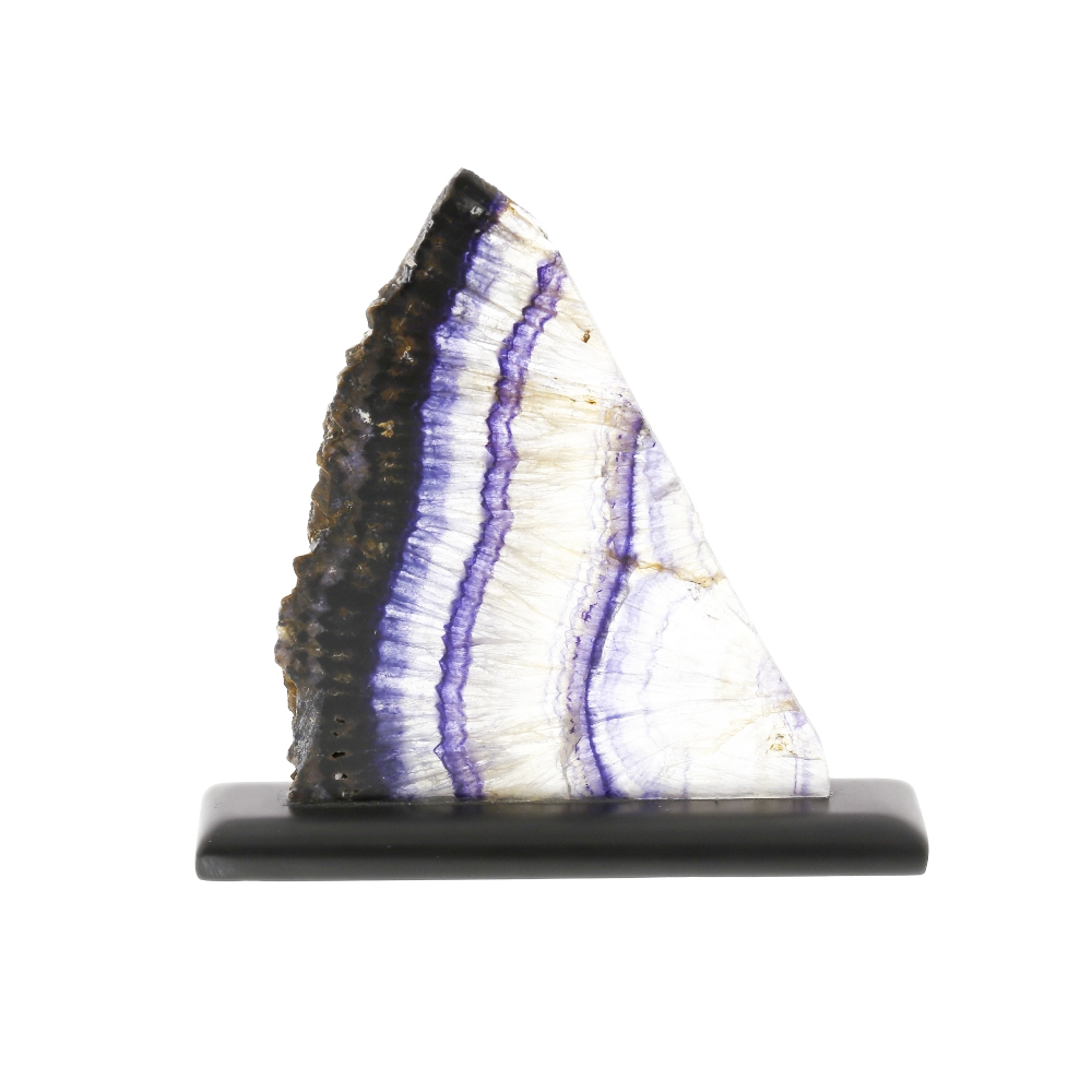 A Blue John slice. Millers Vein Of triangular 'shark fin' form with attractive radial 'tree ring'