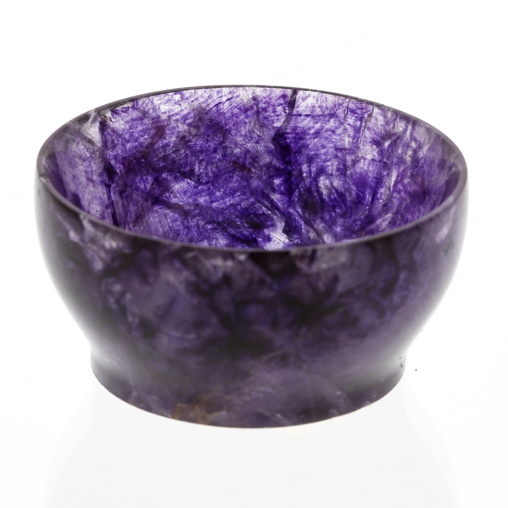 A small Blue John bowl. Of footed hemispherical form with lilac and violet marbling, 45mm diameter x