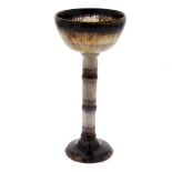 A Blue John pedestal cup. Millers Vein The hemispherical bowl with dark rim over fine lilac parallel