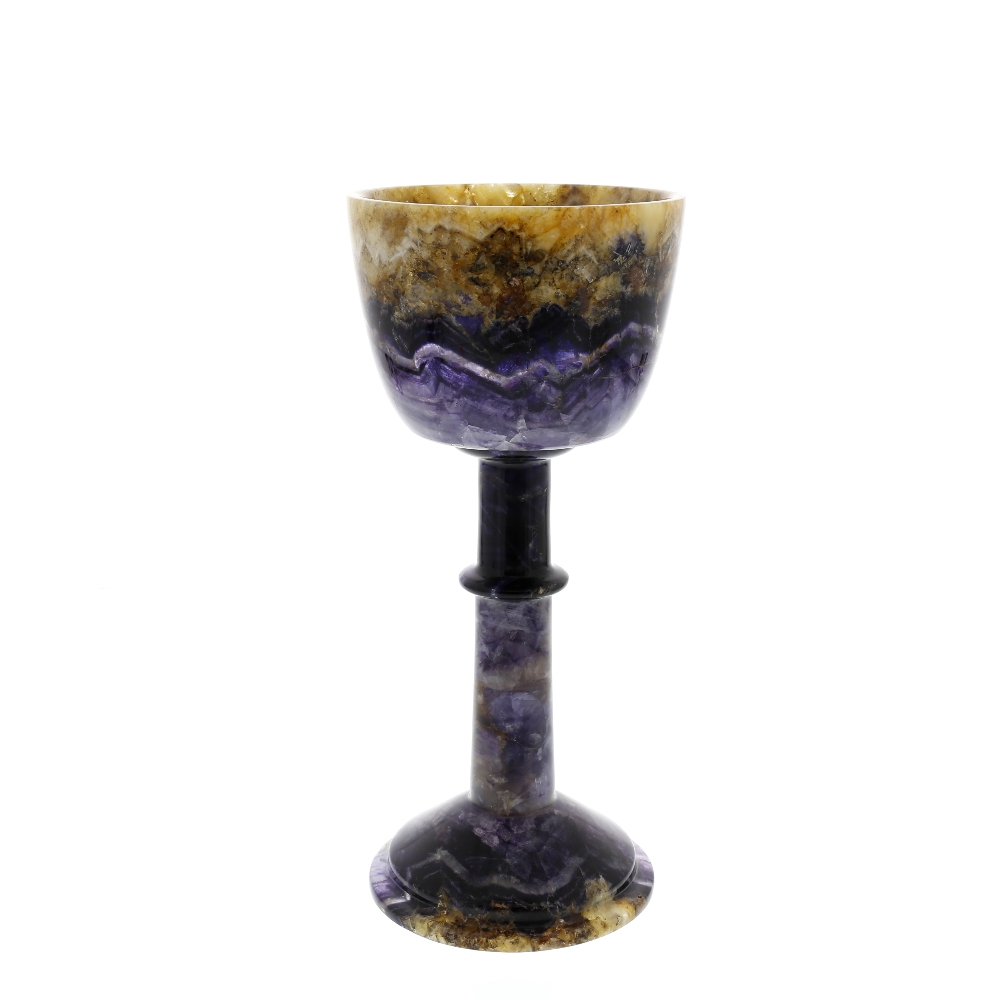 A Blue John chalice. New Cavern Vein The rounded bucket bowl over marbled rim and bands of zig-zag