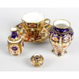 A Royal Crown Derby vase, of squat baluster form having crimpled and frilled collar to neck and