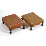 A pair of tapestry footstools. Each having foliate motif upon a pale pink ground, raised upon four