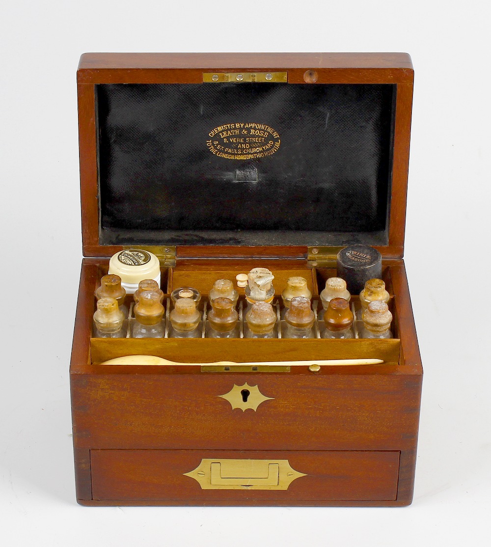 A 19th century mahogany-cased apothecary box The hinged rectangular cover with brass cartouche and