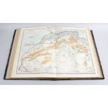 A bound volume of 'The Harmsworth Atlas & Gazetteer' published at Carmeltie House, Carmelite Street,