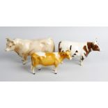 Five Beswick studies of cows and bulls. Together with a Melba ware shire horse and similar Sylvac