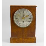 An oak cased RAF mantel clock. Made by Elliott, the 5-inch silvered Roman dial with RAF symbol