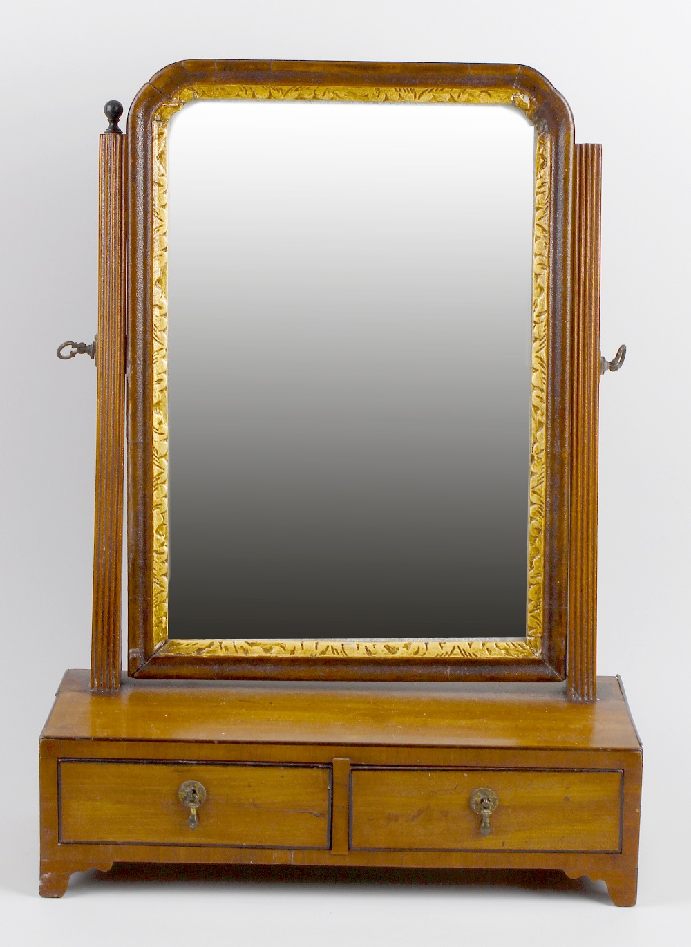 A 19th century swing dressing table mirror. The rectangular bevelled plate within wooden frame