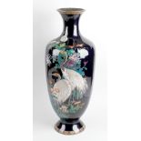 A good large Japanese Meiji period cloisonne vase. Of ovoid form with tall flared neck and footed