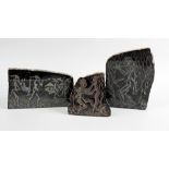 Three Zimbabwean carvings. Each incised with tribal figures, on polished slate/greenstone surface,