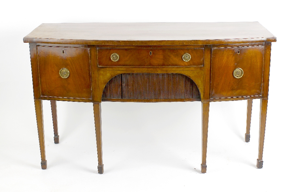 A 19th century mahogany bowfront sideboard, with central drawer and flanked by two cupboard doors,