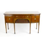 A 19th century mahogany bowfront sideboard, with central drawer and flanked by two cupboard doors,