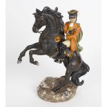 A Royal Doulton figure, 'Dick Turpin' HN3272. Modelled upon black horse and naturalistic base,