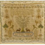 A framed Victorian sampler. Having single verse above central tree and deer, by 'Ruth Weavers