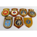 Ten hand painted moulded and other ships crests.Dainty, Hunts, Inverness, Relentless, Leander,
