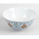 A Chinese doucai porcelain bowl Of circular form with sloping sides with pale blue double ring to