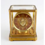 A Jaeger Le Coultre Atmos clock, the 5-inch chapter ring having Arabic quarters and hour