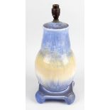 A Ruskin crystalline glaze lamp base. Of bulging form decorated with merging blue and yellow