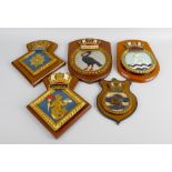 Ten hand painted moulded and other ships crests. Protector, Cerberus, Walney, Hecate, Phoebe,