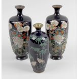 A small matched pair of Japanese Meiji period cloisonne vases, the ovoid shaped bodies with a blue