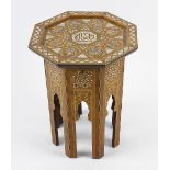 An early 20th century Eastern-style octagonal occasional or sewing table, the hinged mother-of-pearl