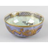 A 20th century Wedgwood dragon lustre bowl, of circular outline, the interior decorated with gilt