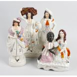 A Staffordshire flat back figure group, modelled as two young kneeling females, the base with