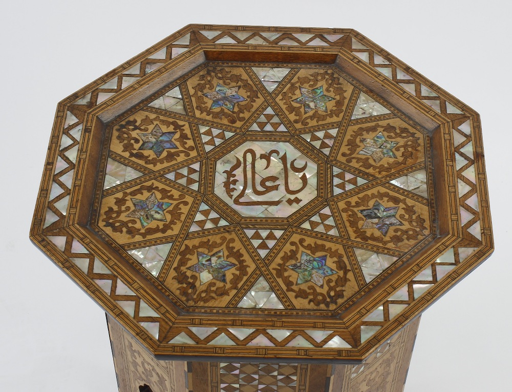 An early 20th century Eastern-style octagonal occasional or sewing table, the hinged mother-of-pearl - Image 2 of 3