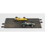 A scaleltric set 12E model race set. With high speed banking sections in original box. Used, worn