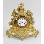 A late 19th century gilt spelter cased mantel clock, the 2.75 white enamelled dial with breguet