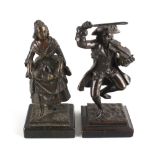 A pair of late 19th century figures modelled as a male fiddler and female dancer, he raising his