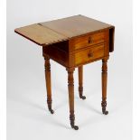 A mahogany drop leaf side table. The square top above two graduated drawers, raised upon four turned