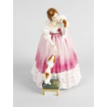A Royal Doulton Queens of the Realm figure, 'Queen Victoria' HN3125, numbered 3855 beneath.