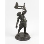 An early 19th century Grand Tour bronze figure. Modelled as a Bacchanalian male with raised