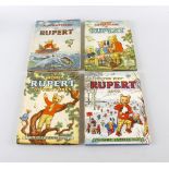 A group of four Daily Express Rupert the Bear children's books, comprising a 1950 'Adventures of