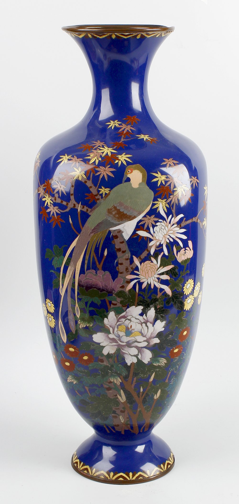 A good large Japanese Meiji period cloisonne vase. The squared body with blue ground, decorated a